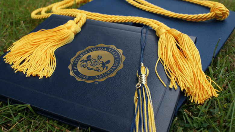 Penn State dark blue diploma case with gold tassel and cord