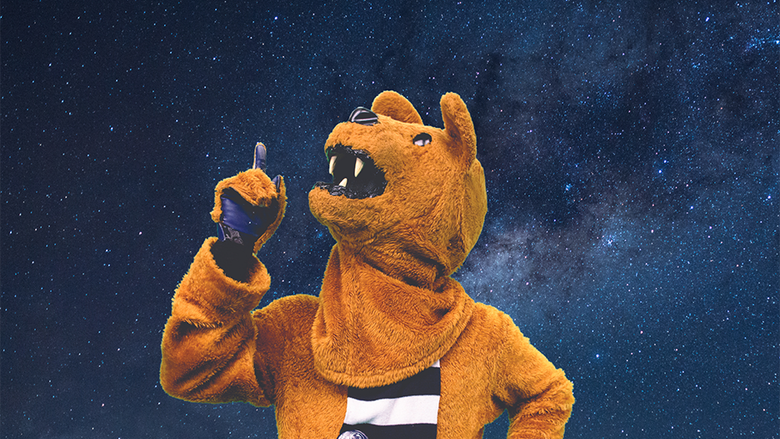The Nittany Lion pointing up at a star-filled sky.