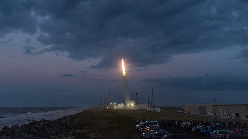 Number 3 in a five-photo series of the rocket launch