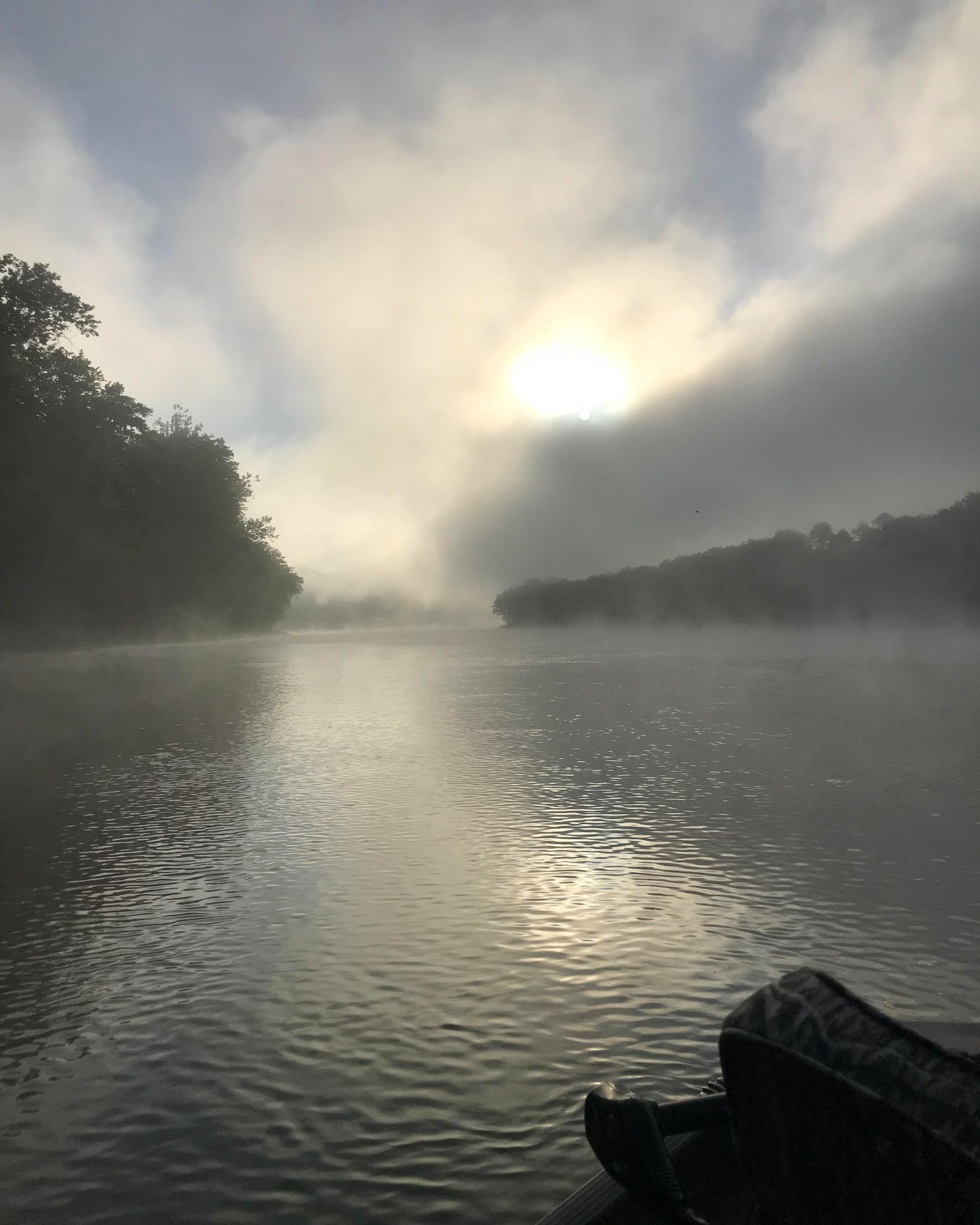 The Susquehanna River in the early morning with fog floating low over the water