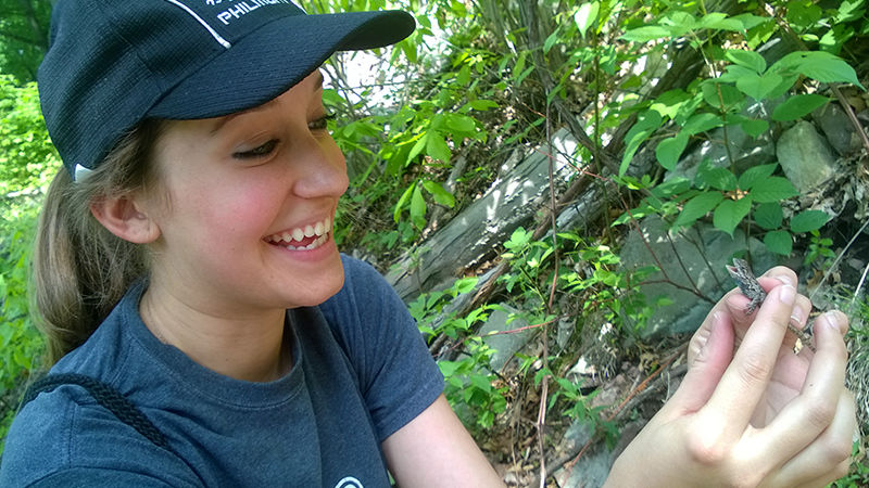 Bethany Dennis with her first lizard capture