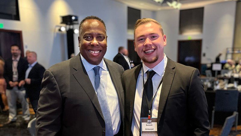 Penn State Wilkes-Barre alumnus Logan Baseski with PepsiCo CEO Steven Williams posing for a photo at a business event