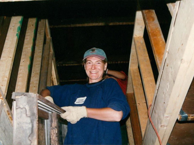A woman working on a construction project.