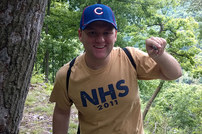 Matt Korea, aspiring dentist, capturing fence lizards