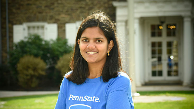 Mrigakshi Verma standing in front of Hayfield House at Penn State Wilkes-Barre