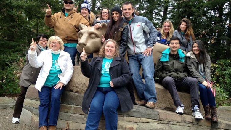 club members at Nittany Lion shrine