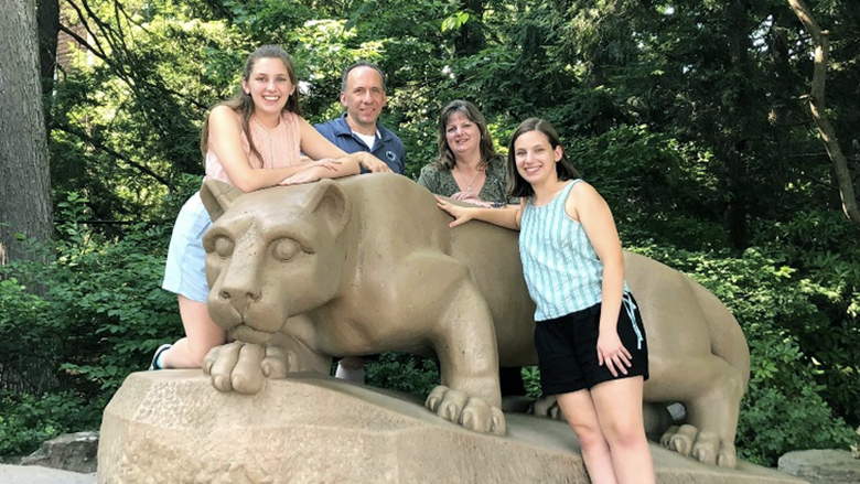 The Farber family (Hannah, Paul, Renée and Laura) at the Nittany Lion Shrine