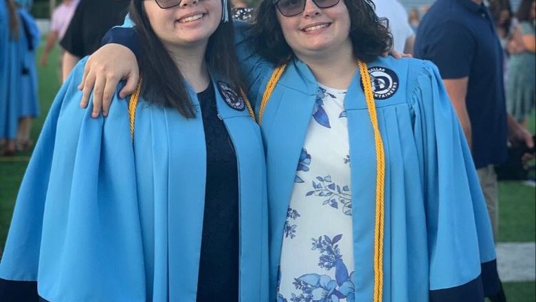 Alyssa and Kayla Hopple at their high school graduation.