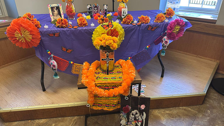 A decorated ofrenda on a table.