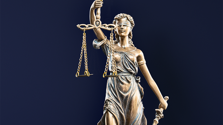 A statue of Lady Justice holding scales.