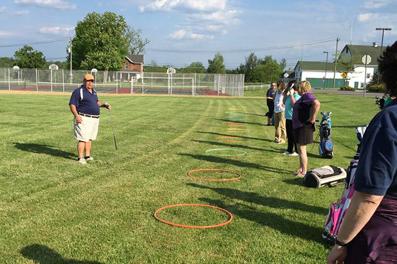 Golf coach Ed Keil teaches ladies golf clinic