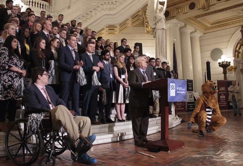 President Barron in front of rotunda steps with podium