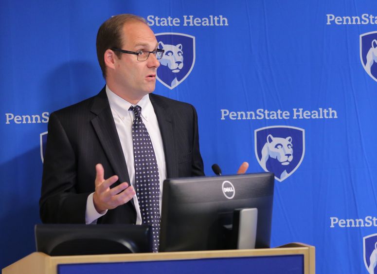 Dr. James Waxmonsky speaks at a news conference.