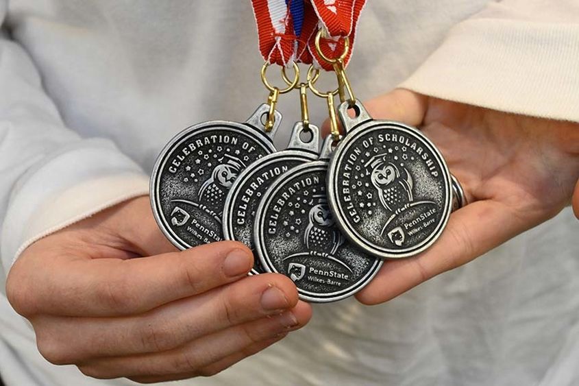 A close-up image of awards medals
