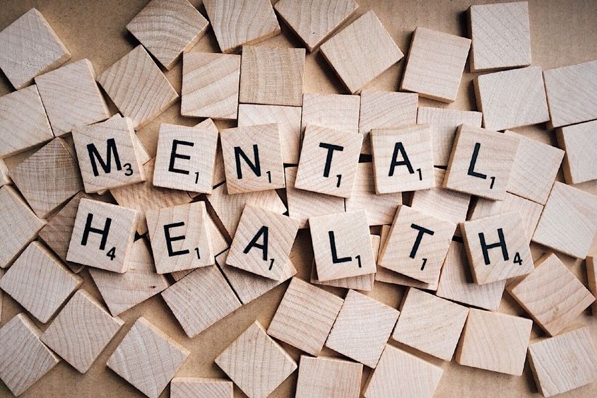 Letter tiles spelling "mental health"