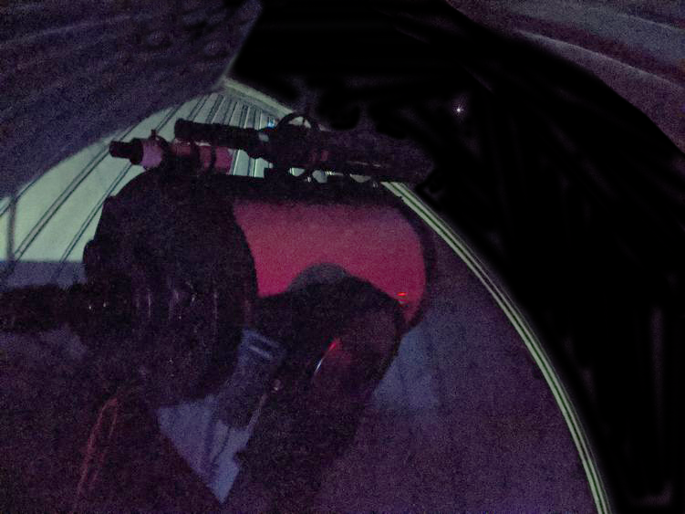 The telescope at the Friedman Observatory viewing Mars on a clear night The telescope at the Friedman Observatory viewing Mars on a clear night