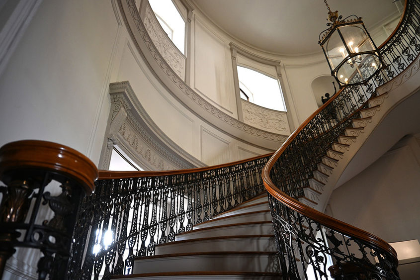 A photo of a grand staircase inside a mansion