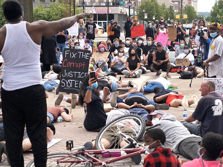 An image of protesters in the streets during a Black Lives Matter protest.